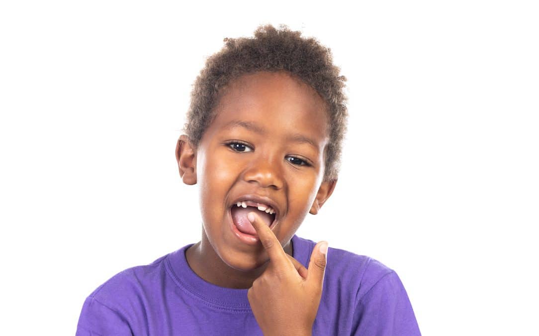 can-i-pull-my-childs-loose-tooth-at-home